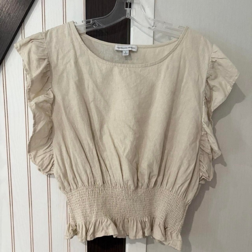 Cupcakes and Cashmere cream blouse with ruffles in size L